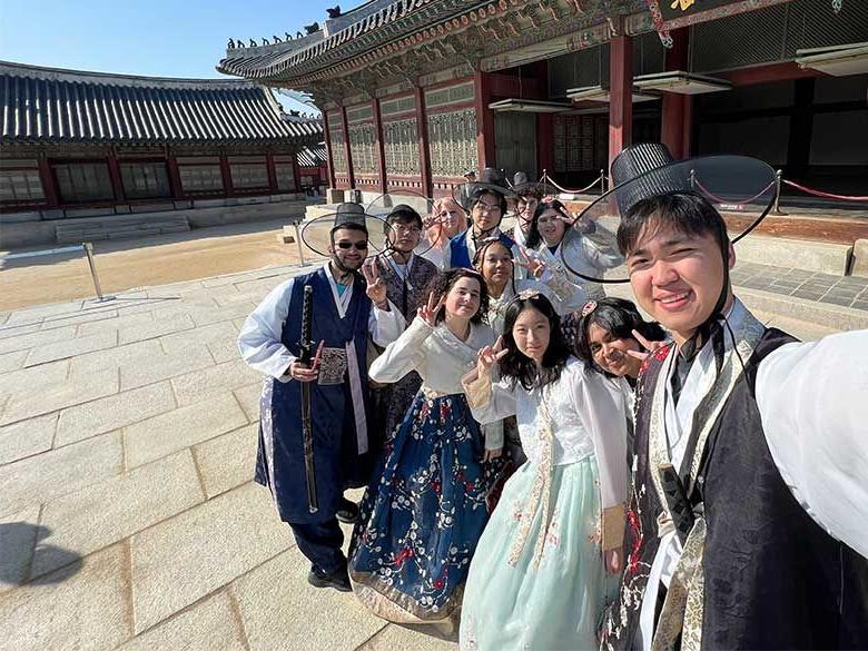 Group of students smile for photo in South Korea