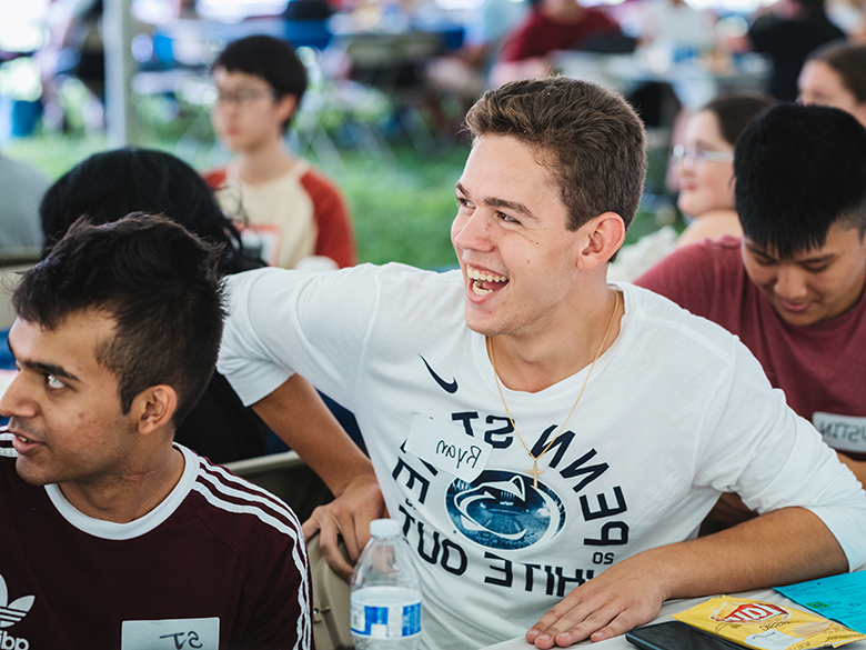 student laughing at an event